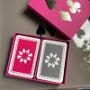 Fuchsia sleeve box with pink & grey playing cards