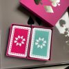 Fuchsia sleeve box with pink & jade playing cards