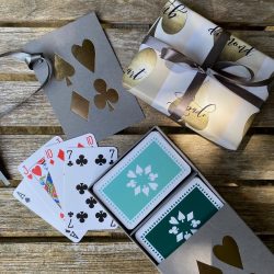 Grey sleeve box with dark green and jade playing cards set
