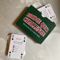 A cardboard pack of two sets of cards with bridge questions on one side and answers on the reverse.