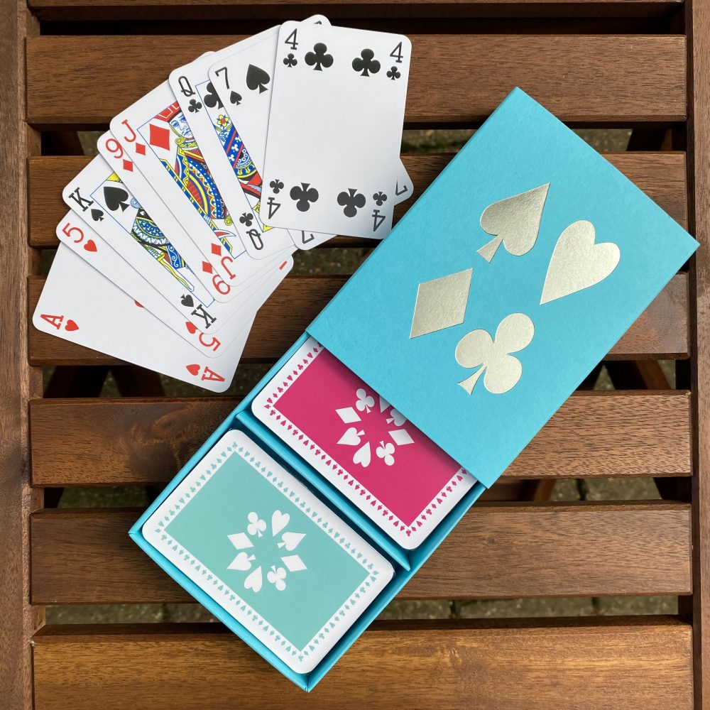 Turquoise sleeve box with pink & jade playing cards