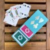 Turquoise sleeve box with green & pink playing cards