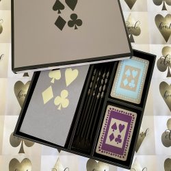 complete bridge game in grey lacquer box contains 4 pencils, 4 grey scorepads in either rubber or chiacago and two decks of cards in purple and duck egg